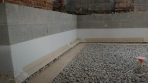 Interior waterproofing system in a basement