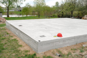 Cement foundation of a new house on a construction site. Laying a concrete foundation